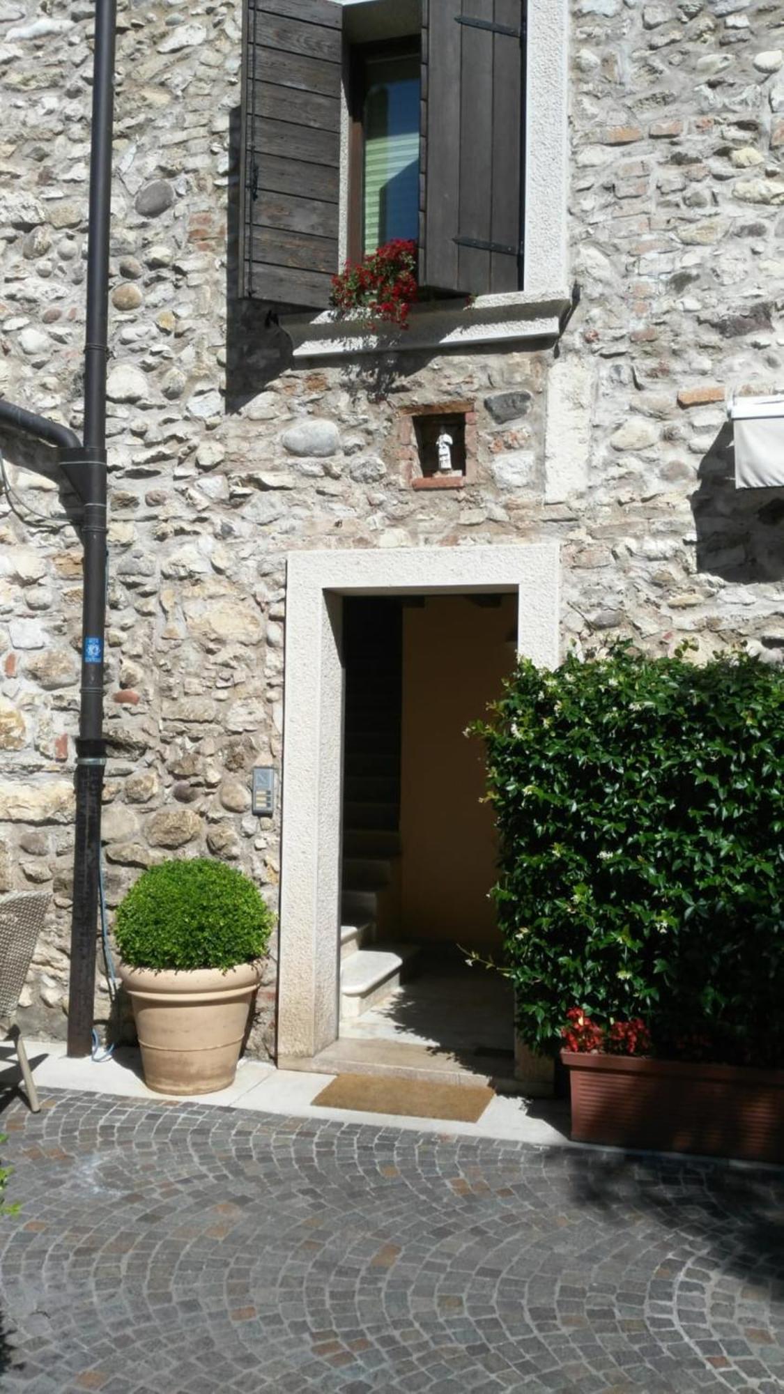 Corte San Luca Apartments Бардоліно Номер фото